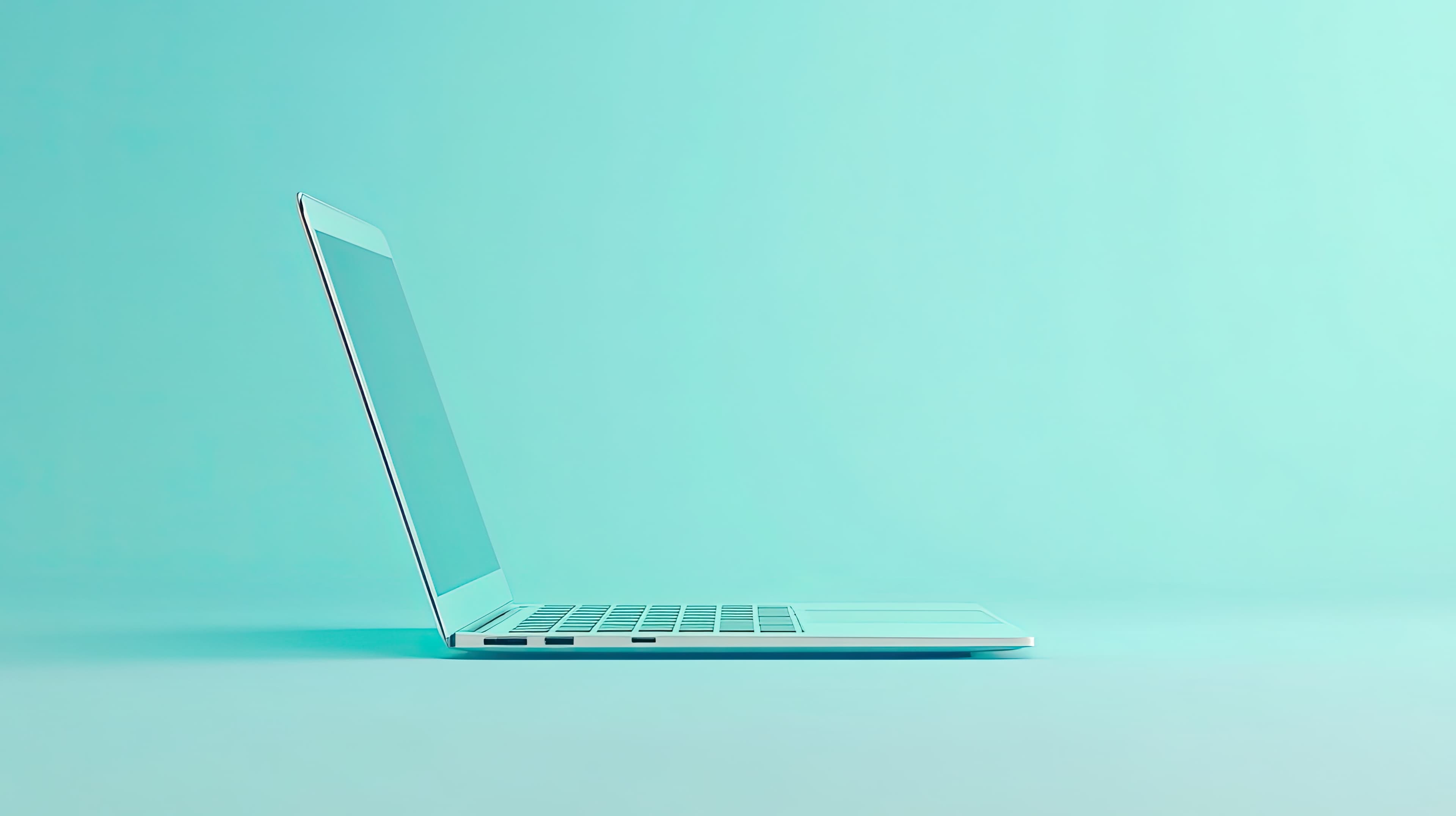 Laptop open on a teal background representing getting started with the Hub